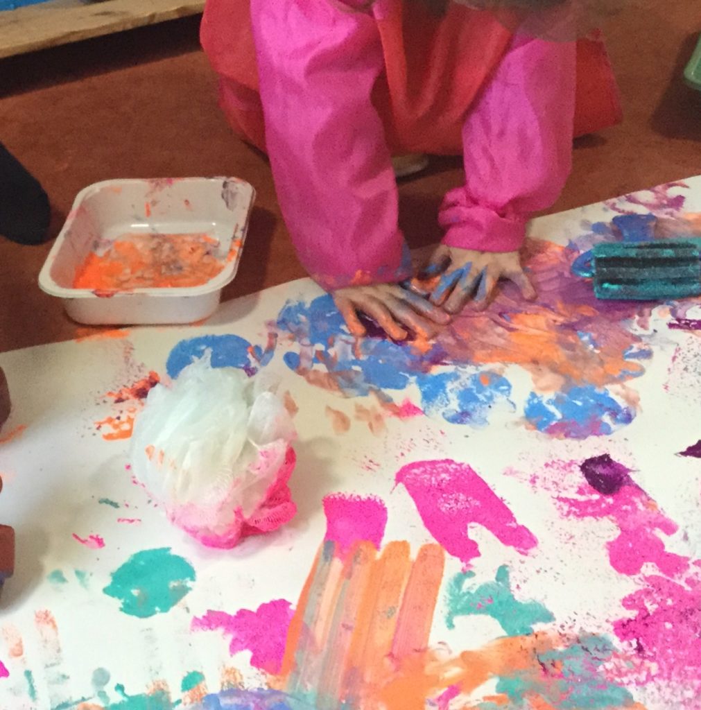 Child finger painting